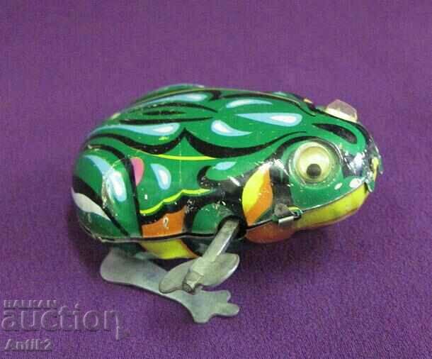 Delivery of Old Mechanized Children's Toy - Frog