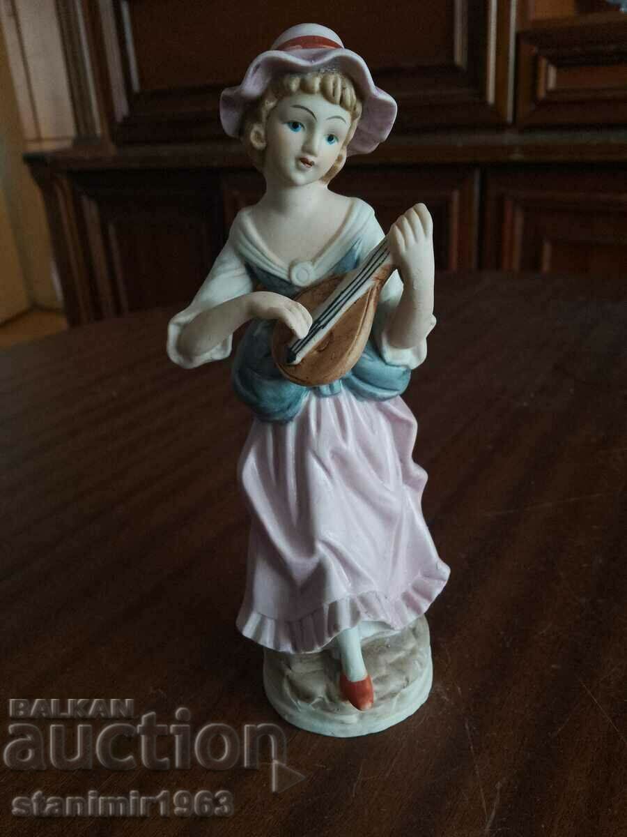 A beautiful, collectible porcelain figure from porcelain marked