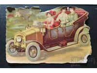 Old cardboard cutout of a vintage car riding in..
