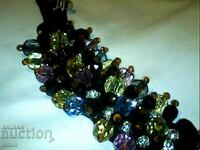 a beautiful crystal necklace is a costume bead