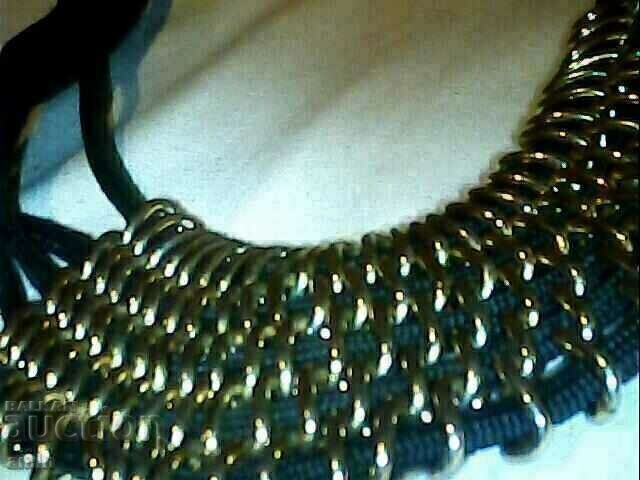 Auction necklace is a bracelet made of steel for costume Auction necklace is a bracelet made of steel for costume