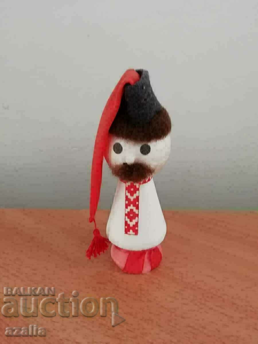 Figure of a guy in folk costume - Russian souvenir