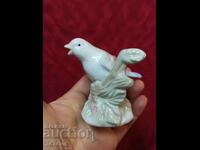 Porcelain sculpture of a bird in a beautiful form