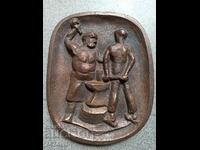 A massive bronze panel—Kovachi—by sculptor Alan Ebeling