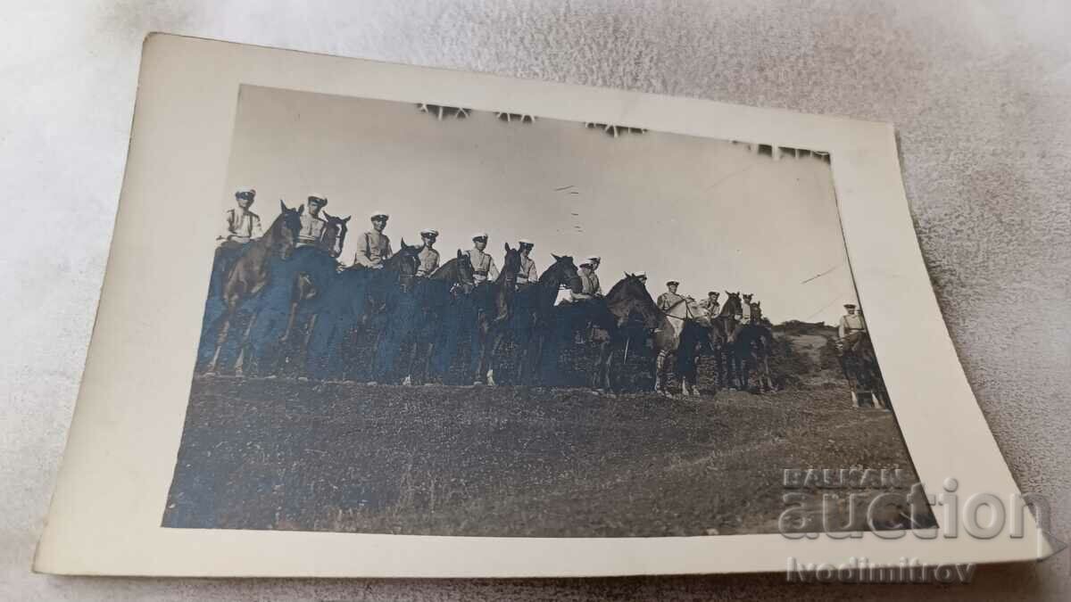 Photo Cavalrymen on black horses