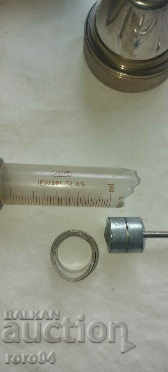 Auction  SYRINGE - STERILIZATION CONTAINER