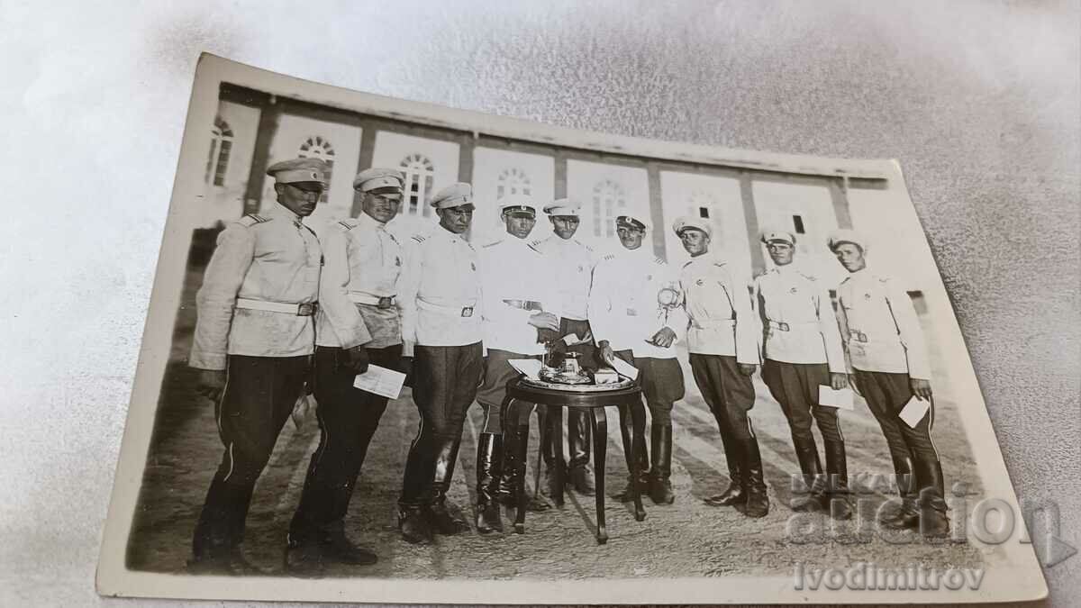 Photo Sergeants in white uniforms in the barracks