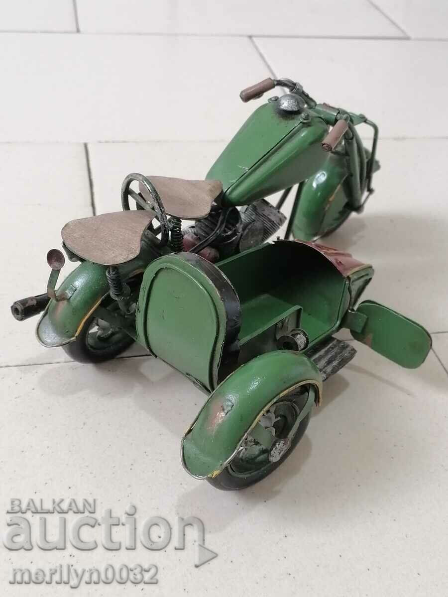 Auction Children's tin toy motorcycle with a handmade basket Auction Children's tin toy motorcycle with a handmade basket