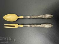 A pair of silver forks with ivory. #5236