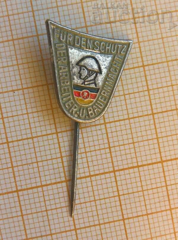 GDR badge for the protection of workers and peasants