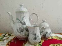 Tea and milk jugs and porcelain sugar bowl