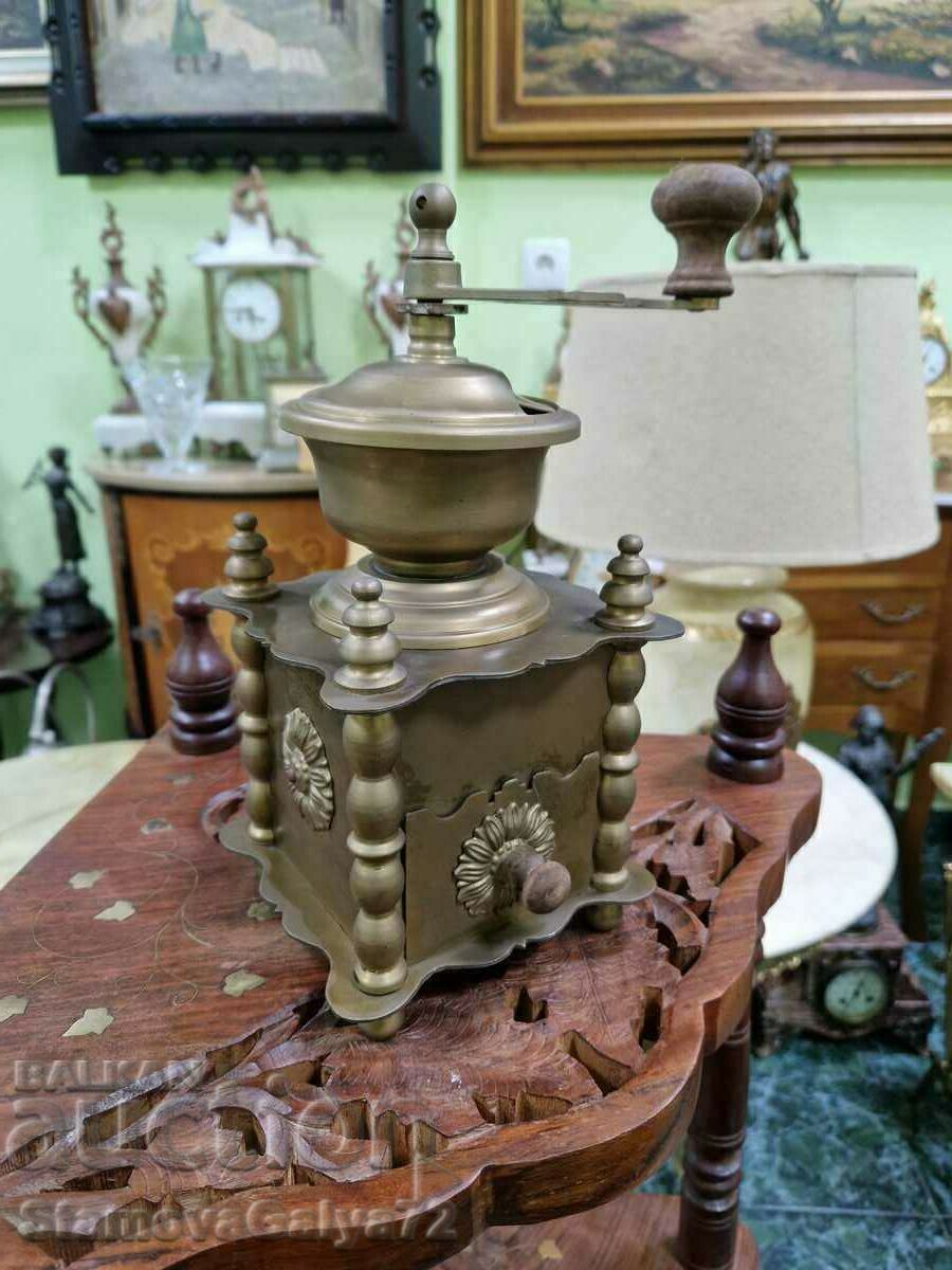Delivery of A great antique Belgian bronze coffee grinder