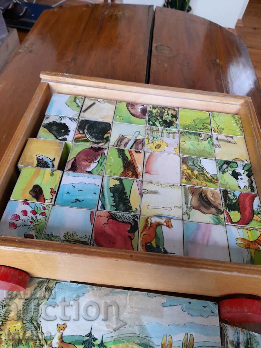 Delivery of An old children's game with cubes Delivery of An old children's game with cubes