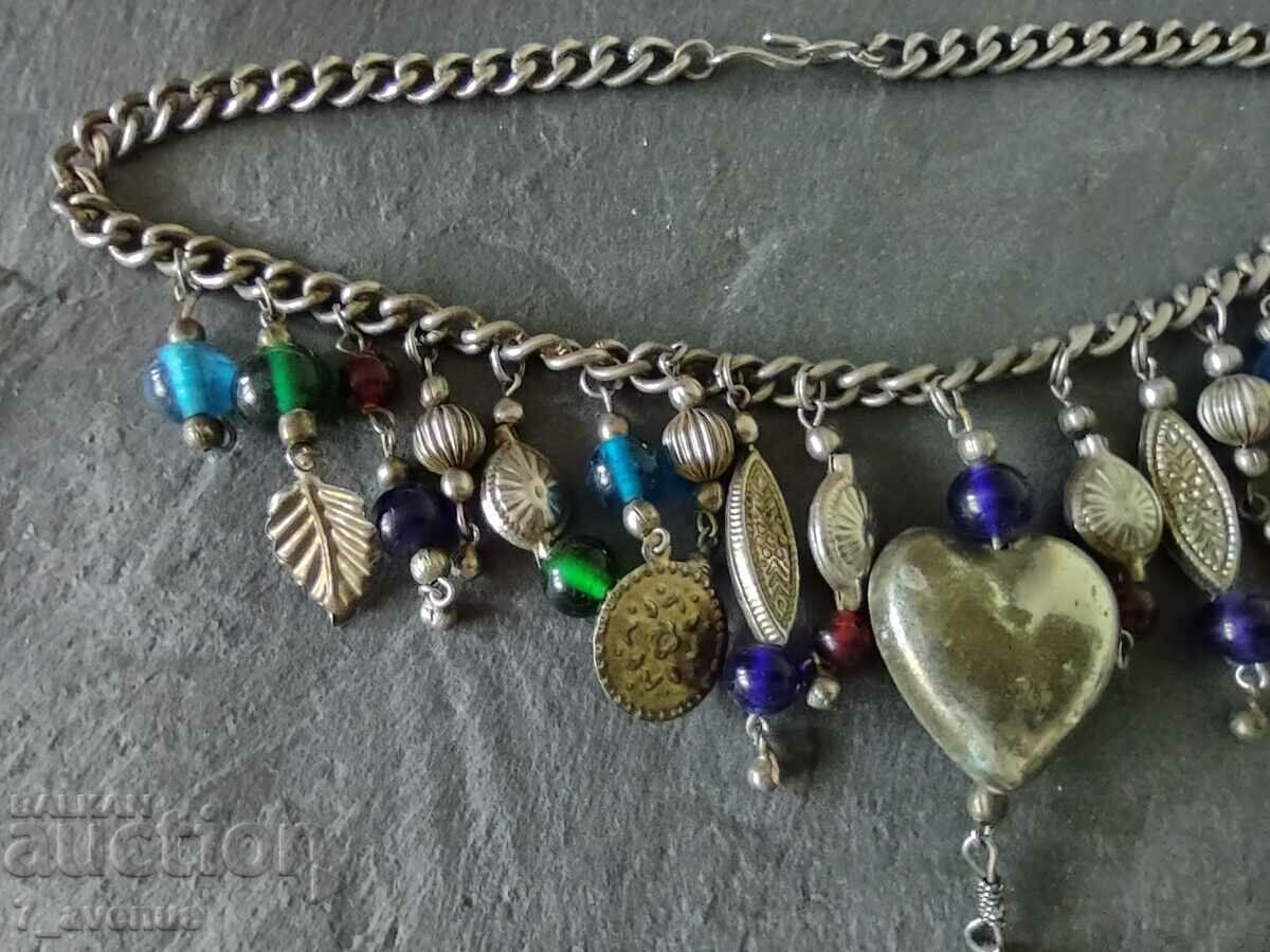 Auction  NECKLACE necklace jewelry, ethnic with motifs, and for costume 21.03.2024