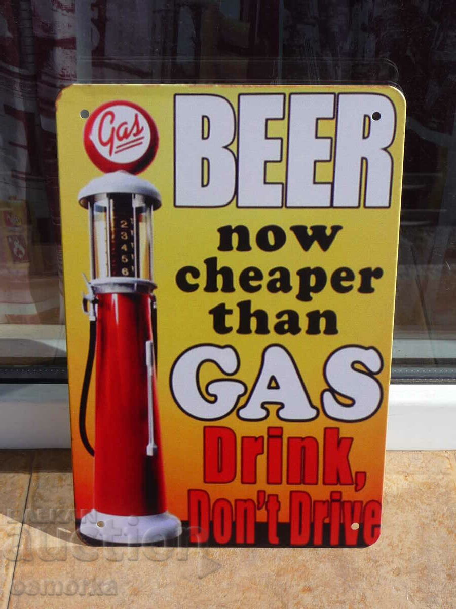 Metal sign beer is cheaper than petrol don't drive drunk