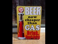 Metal sign beer is cheaper than petrol don't drive drunk