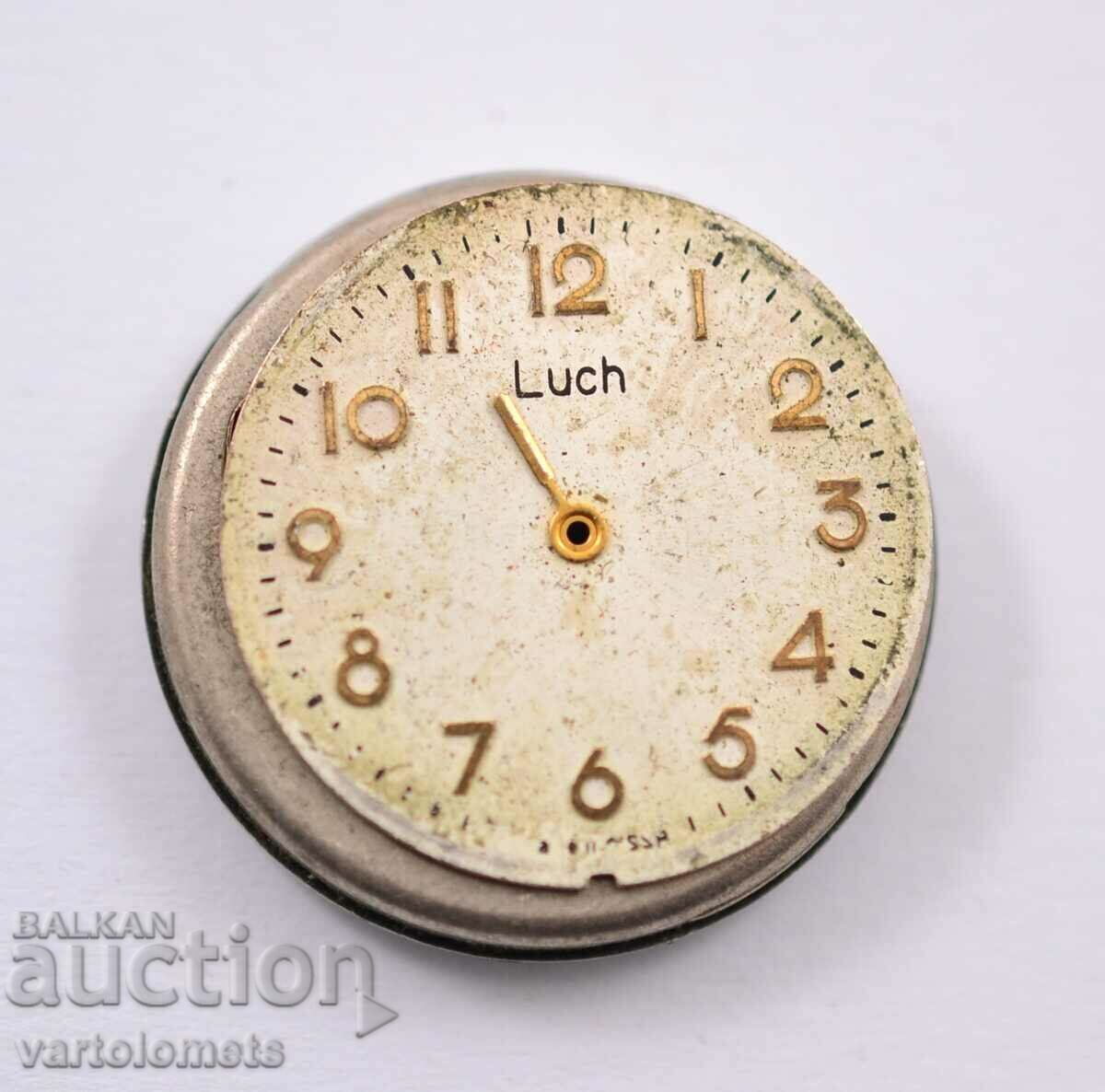 Dial and back cover of a LATCH women's watch