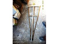 A PAIR OF WOODEN CRUTCHES