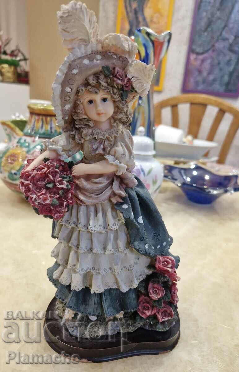 Beautiful doll made of polyresin