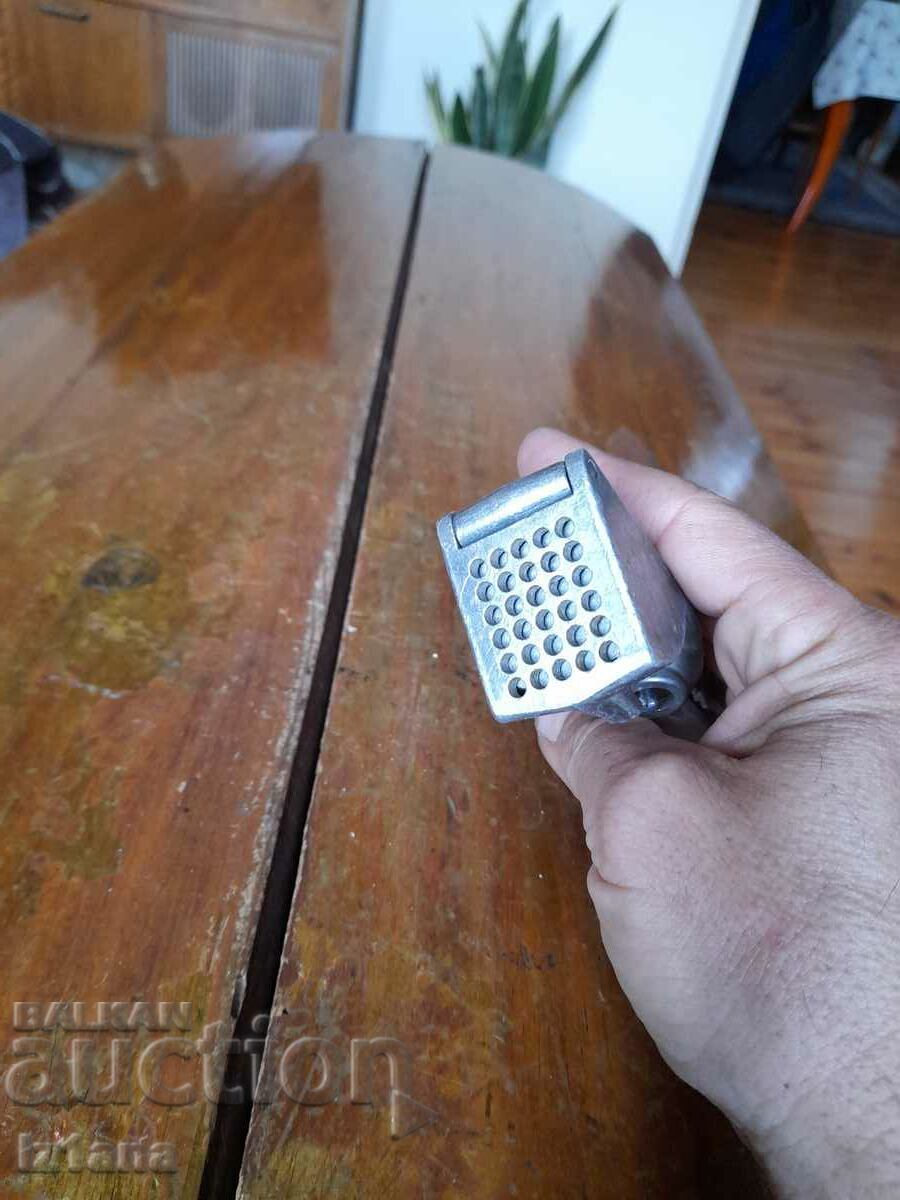 Delivery of Old aluminum garlic press Delivery of Old aluminum garlic press