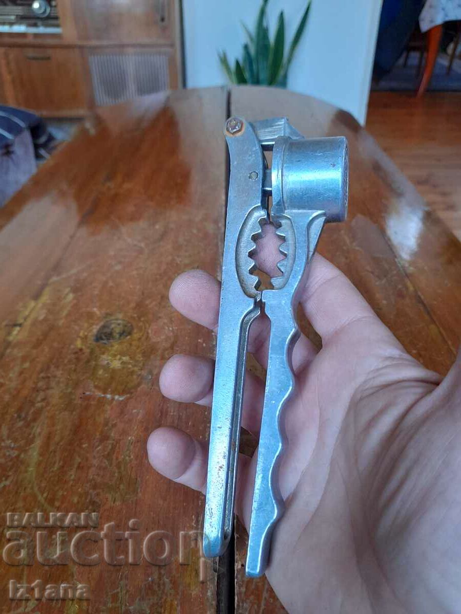 Auction  Old aluminum garlic press
