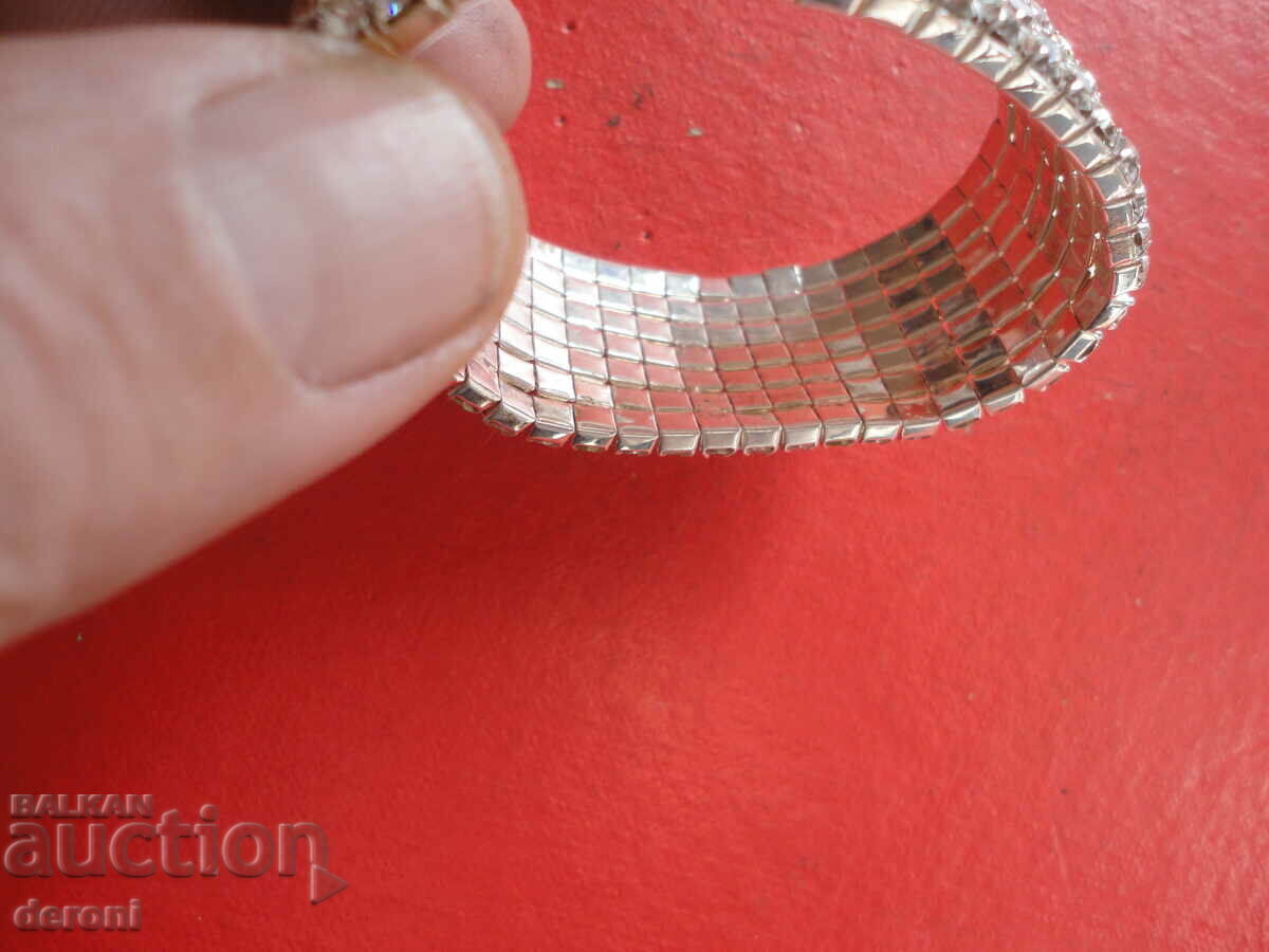 Auction  Amazing bracelet with stones