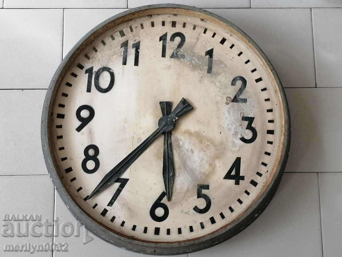 An old electric wall clock from the social work plant NRB - 6