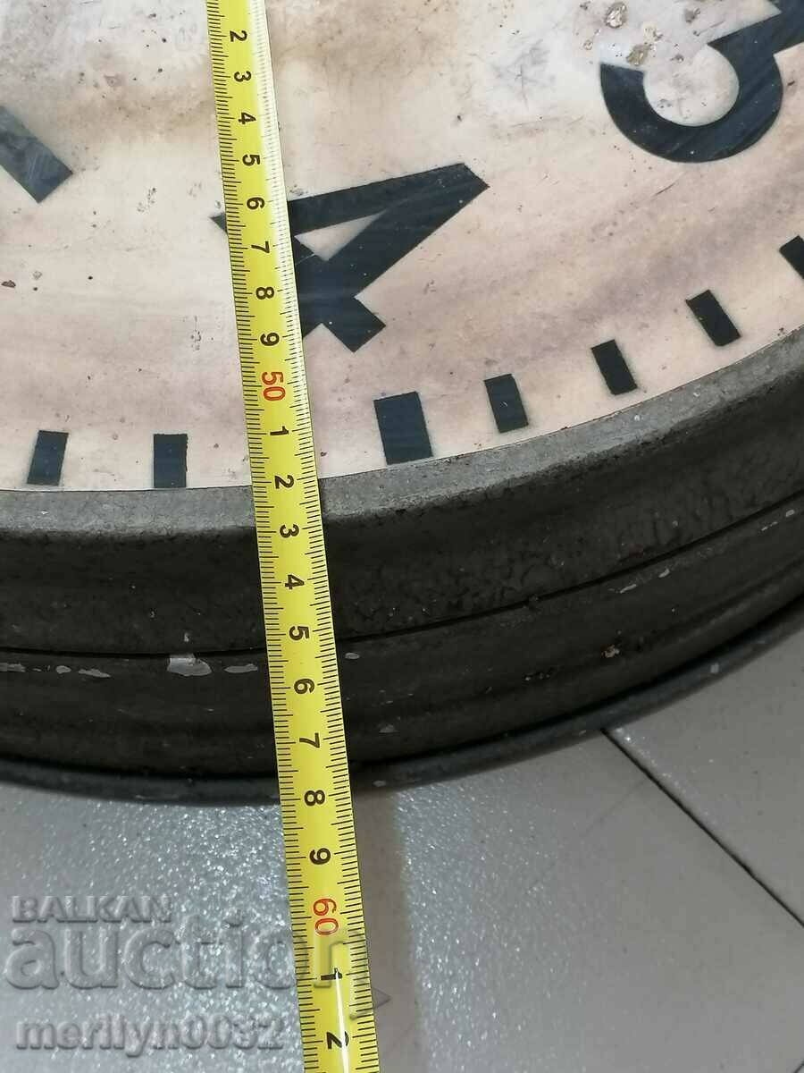 An old electric wall clock from the social work plant NRB - 7