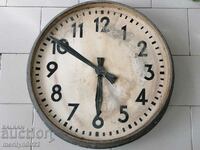 An old electric wall clock from the social work plant NRB