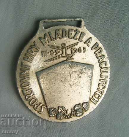 Medal plaque 1965 - "Sports games for youth and workers" with price 3.00 BGN | € 1.53 Medal plaque 1965 - "Sports games for youth and workers" with price 3.00 BGN | € 1.53