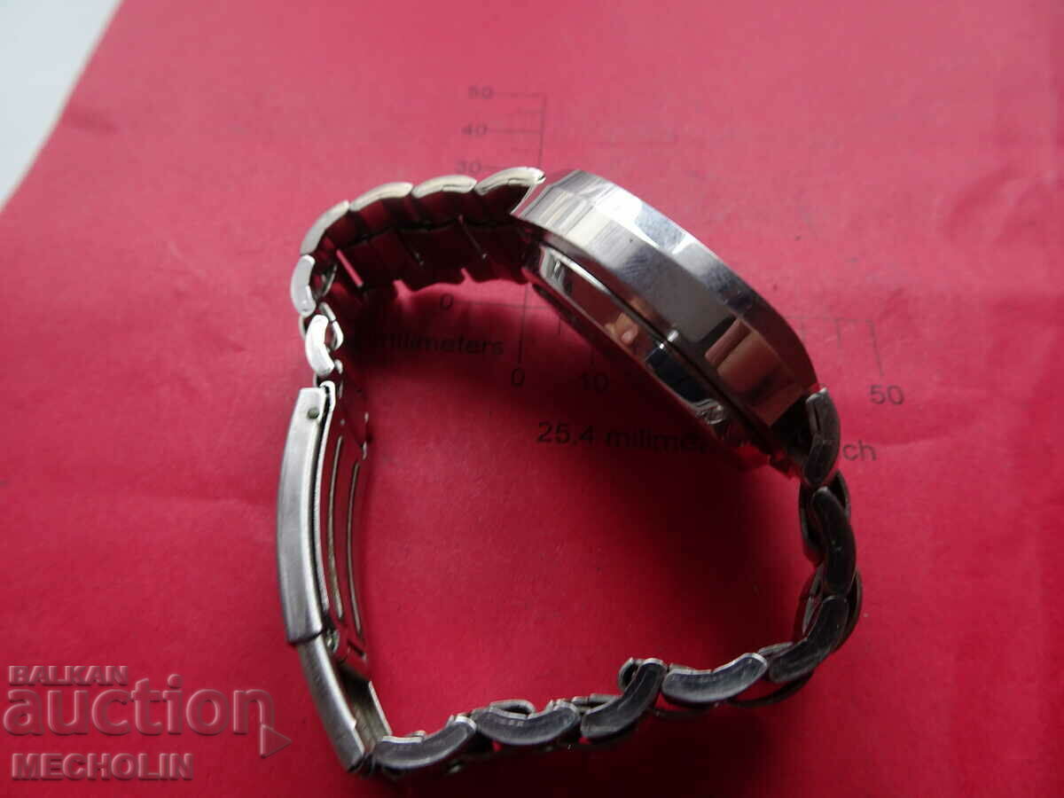 Delivery of DUGENA SWISS QUARTZ WATCH Delivery of DUGENA SWISS QUARTZ WATCH