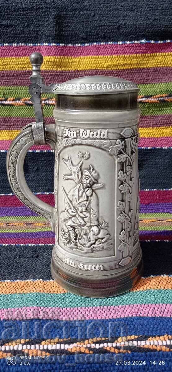 German mug with hunting motifs