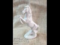 A beautiful porcelain horse figure