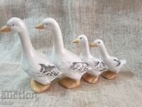 A beautiful porcelain figurine of a family of ducks