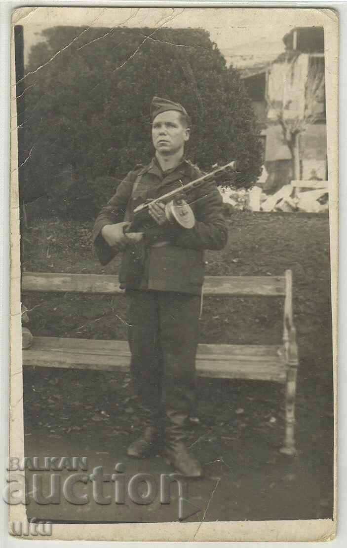 Original photo, man with machine gun