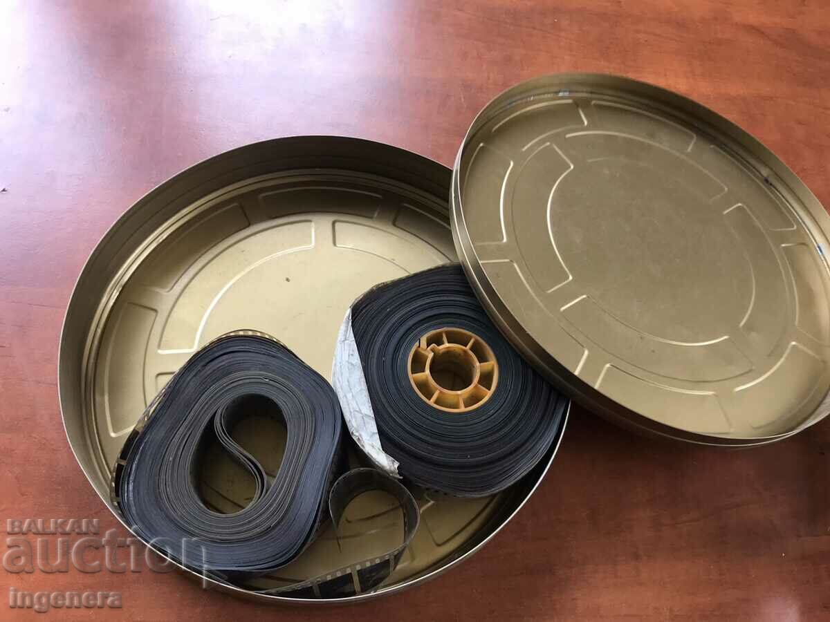 Delivery of 35 MM FILM TAPE METAL BOX. CINEMA TAPE Delivery of 35 MM FILM TAPE METAL BOX. CINEMA TAPE