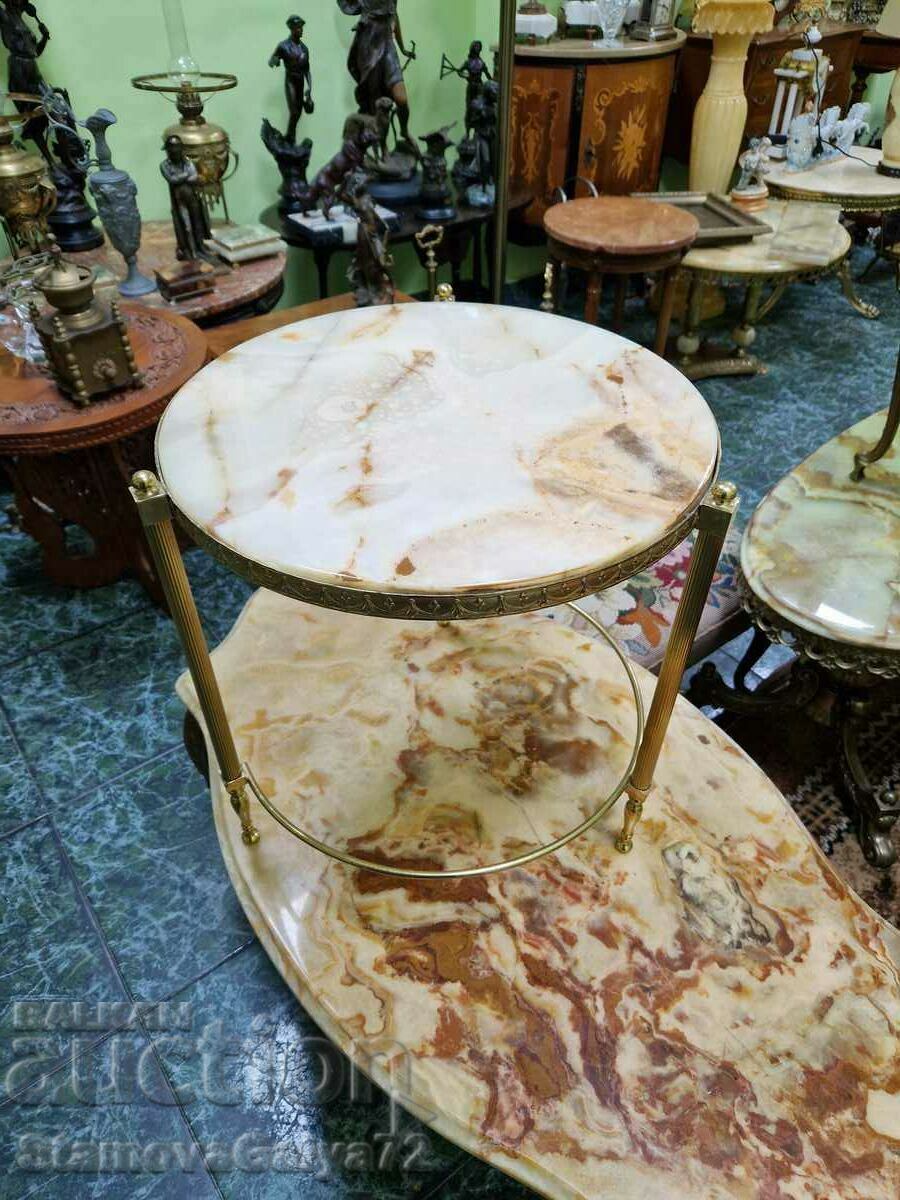 A wonderful antique bronze onyx side table