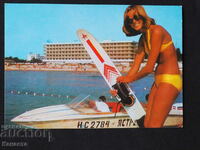 Sunny Beach female tourist with water skis 1980 K416