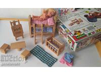 A set of accessories for a wooden dollhouse