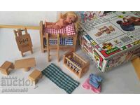 A set of accessories for a wooden dollhouse