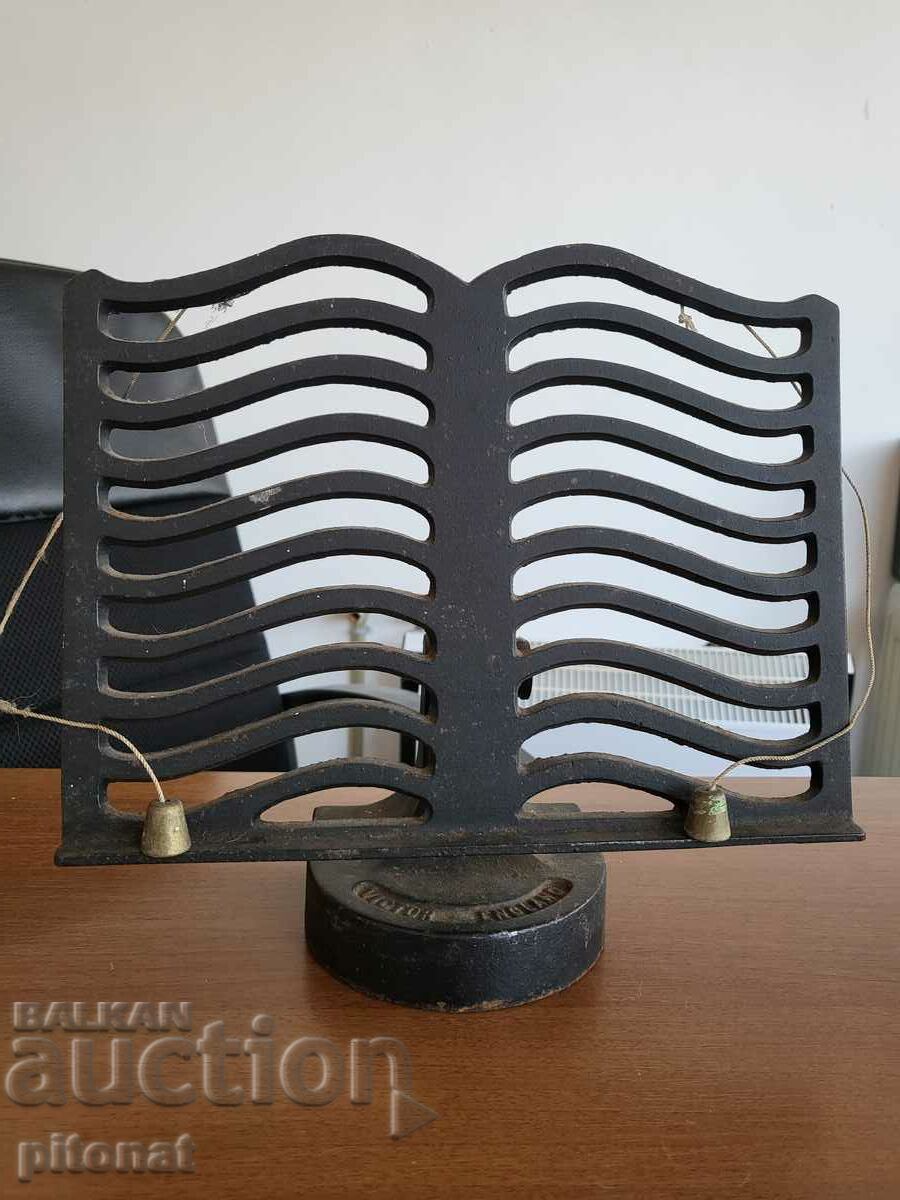 Antique cast iron book stand