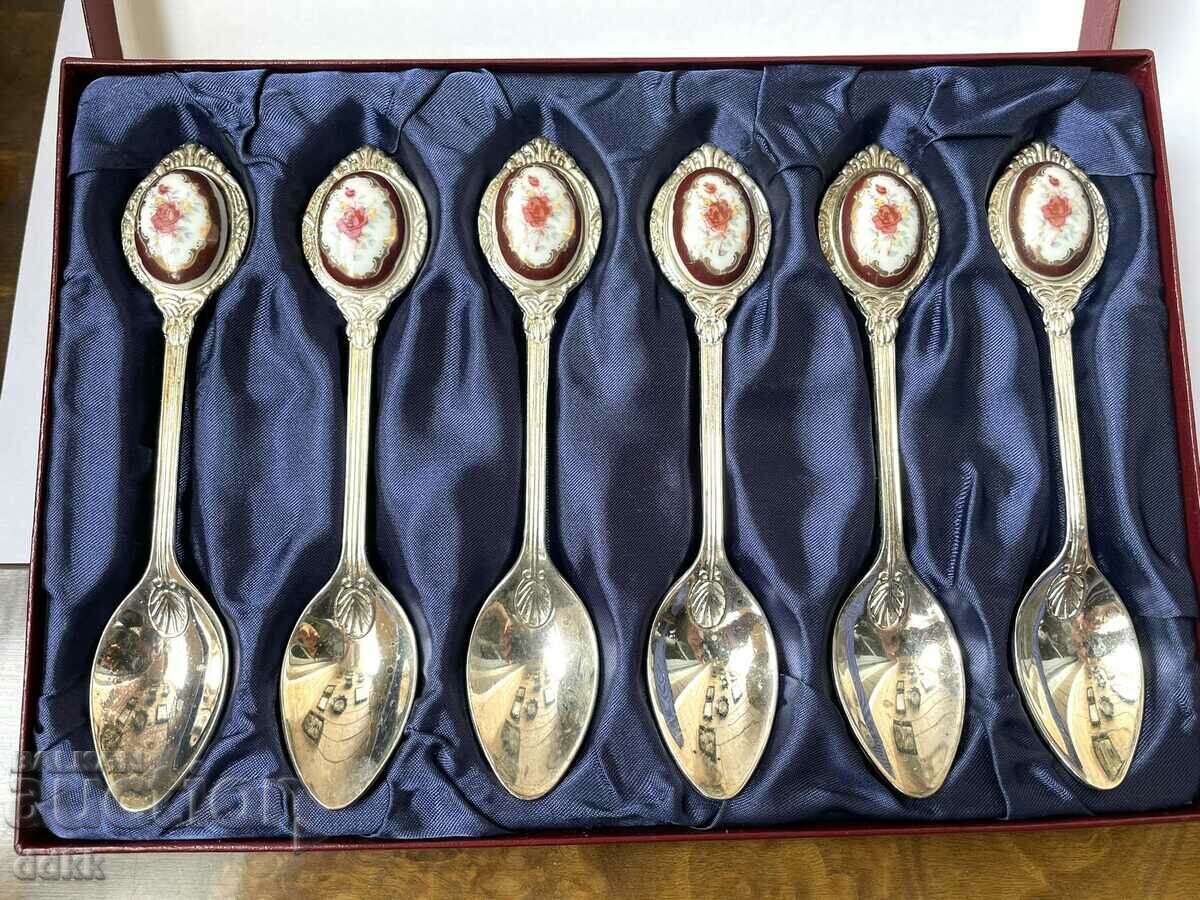 Beautiful silver spoons with roses from England