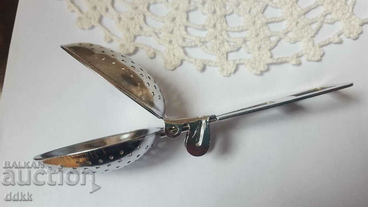 A beautiful tea clip from England with markings