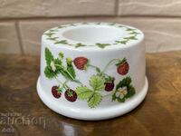 A beautiful porcelain candle holder with wild strawberries from England