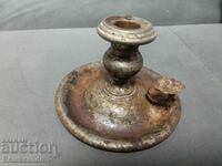 An interesting old candle holder