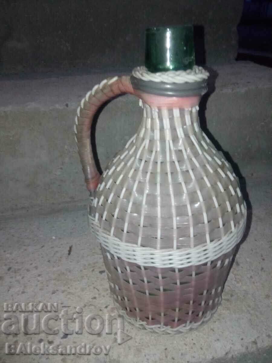 Auction Sots damajana of colored green glass Auction Sots damajana of colored green glass