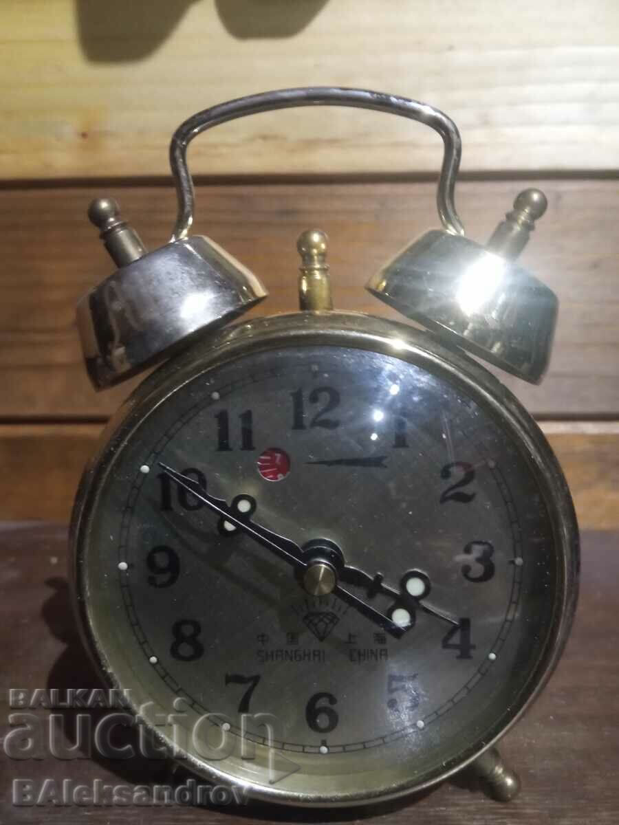 Old alarm clock with calendar