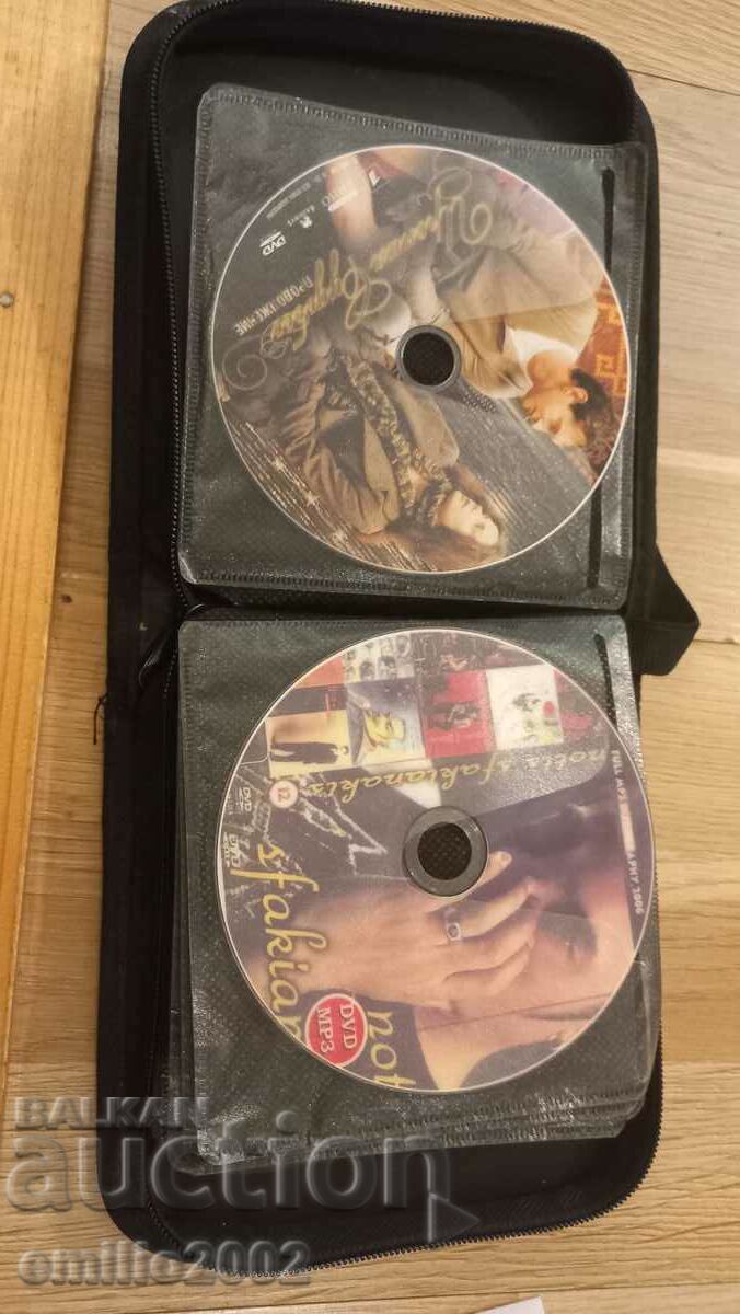 Auction  Movies on DVD in a folder 24 pcs.