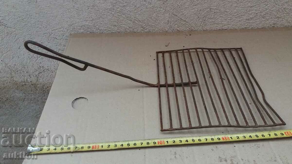 OLD SOLID METAL GRILL