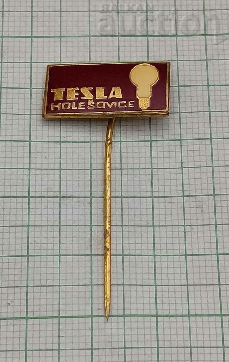 TESLA ЗНАЧКА